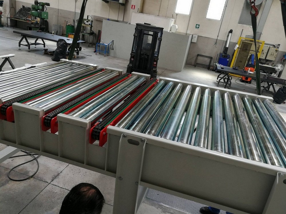 Devio a 90° con Scambio Rulli Catene